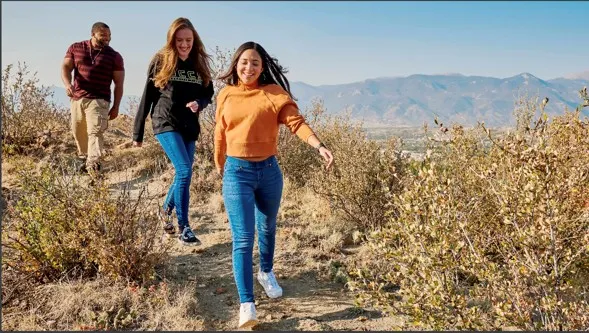 Students walking on a trail
